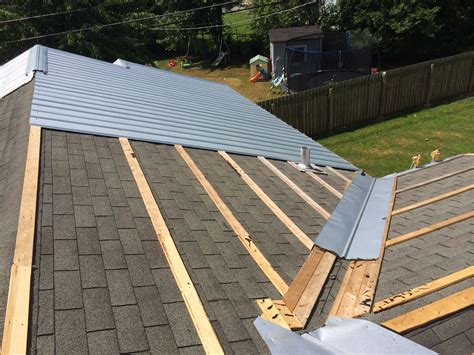 how to put a metal roof on house|step by metal roof installation.